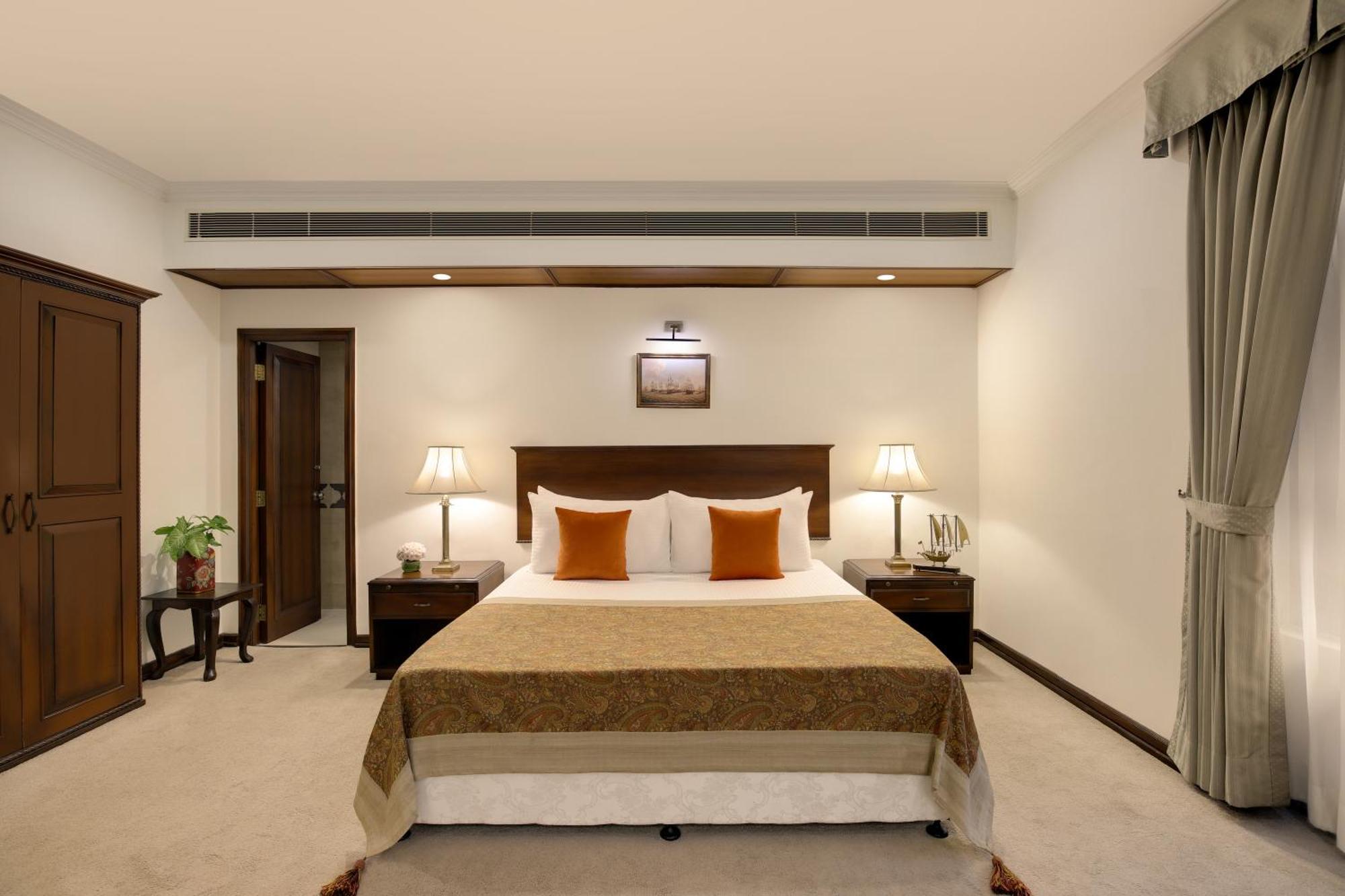 Ambassador, New Delhi - Ihcl Seleqtions Hotel Kültér fotó A bedroom at the Taj Bengal